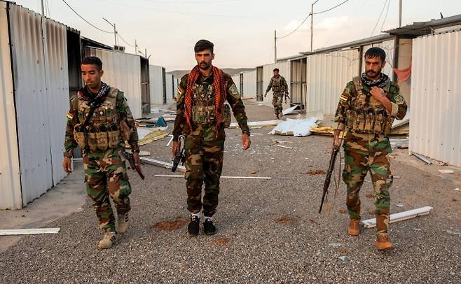 이라크 쿠르드 자치지역 수도 에르빌 북쪽에서 활동 중인 쿠르디스탄 자유당(PAK) 소속 페쉬메르가 전투원들. 이란 접경 지역에서 작전 준비에 나선 쿠르드 무장세력은 미국의 공중 지원이 있을 경우 이란 진입도 가능하다고 주장하고 있다. 2026.3.11 USA투데이