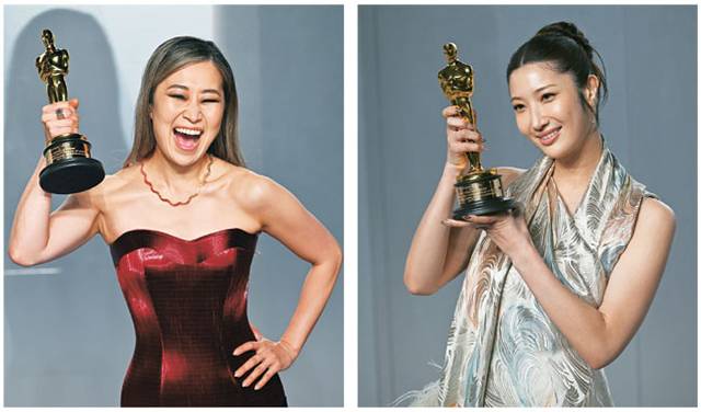 오스카(아카데미) 2관왕을 휩쓴 넷플릭스 ‘케이팝 데몬 헌터스’의 주역인 매기 강(왼쪽 사진) 감독과 가수 겸 프로듀서 이재가 15일(현지시간) 미국 로스앤젤레스 LA카운티미술관에서 열린 베니티 페어 오스카 뒤풀이 파티에서 트로피를 들고 환하게 웃고 있다.  UPI 연합뉴스