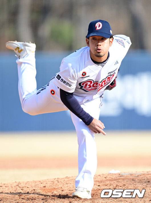 [OSEN=이천, 최규한 기자] 12일 경기도 이천 두산베어스파크에서 ‘2026 신한 SOL KBO리그’ 시범경기 두산 베어스와 키움 히어로즈의 경기가 열렸다.시범경기는&nbsp;오늘(12일)부터&nbsp;오는 24일까지 진행되며, 각 팀이 12경기씩 치러 총 60경기가 펼쳐질 예정이다.8회초 마운드에 오른 두산 타무라 이치로가 힘차게 공을 뿌리고 있다. 2026.03.12 / dreamer@osen.co.kr