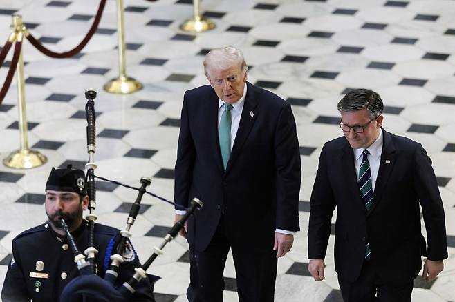 U.S. President Donald Trump, left, and U.S. House Speaker Mike Johnson leave the Annual Friends of Ireland Luncheon at the U.S. Capitol in Washington on March 26. [EPA/YONHAP]