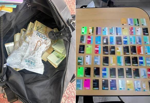 일당에게 압수한 가방에서 현금 1억여 원과 타인 명의 카드 80여 장이 나왔다. [서울강남경찰서 제공]