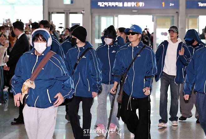 (인천공항=뉴스1) 구윤성 기자 = 그룹 방탄소년단(BTS)이 22일 오전 인천국제공항을 통해 미국 뉴욕으로 출국하고 있다.  2026.3.22/뉴스1  Copyright (C) 뉴스1. All rights reserved. 무단 전재 및 재배포,  AI학습 이용 금지. /사진=(인천공항=뉴스1) 구윤성 기자