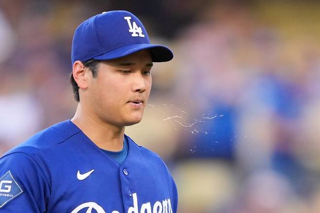 <yonhap photo-3367="">25일(한국시간) 열린 LA 에인절스와의 시범경기에 선발 등판한 오타니 쇼헤이. [AP=연합뉴스]</yonhap>