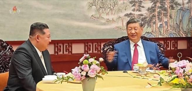 김정은 북한 국무위원장과 시진핑 중국 국가 주석[조선중앙TV 화면]