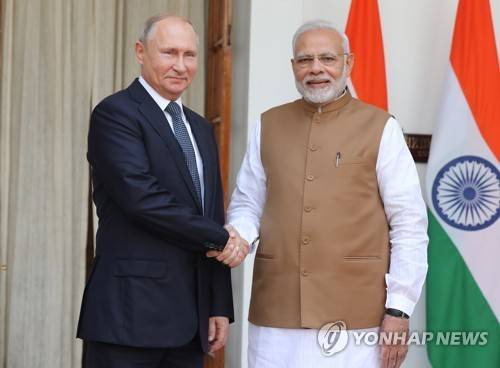푸틴 러시아 대통령(사진 왼쪽)과 모디 인도 총리 [EPA 연합뉴스 자료사진. 재판매 및 DB 금지]