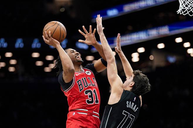 <yonhap photo-2539=""> NEW YORK, NEW YORK - FEBRUARY 09: Jaden Ivey #31 of the Chicago Bulls goes to the basket as Ben Saraf #77 of the Brooklyn Nets defends in the first half at Barclays Center on February 09, 2026 in New York City. NOTE TO USER: User expressly acknowledges and agrees that, by downloading and or using this photograph, User is consenting to the terms and conditions of the Getty Images License Agreement. Evan Bernstein/Getty Images/AFP (Photo by Evan Bernstein / GETTY IMAGES NORTH AMERICA / Getty Images via AFP)/2026-02-10 10:57:00/ <저작권자 ⓒ 1980~2026 ㈜연합뉴스. 무단 전재 재배포 금지, AI 학습 및 활용 금지></yonhap>