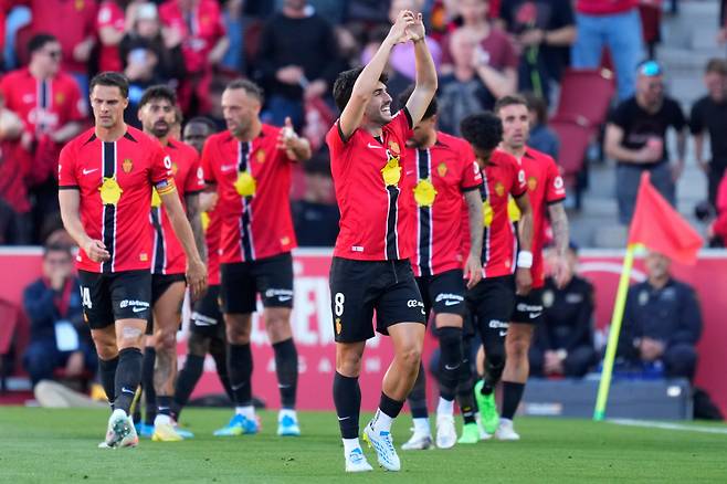 Mallorca's Manu Morlanes celebrates after he scored during a La Liga soccer match between Mallorca and Real Madrid in Palma de Mallorca, Spain, Saturday, April 4, 2026. (AP Photo/Jose Breton)
<저작권자(c) 연합뉴스, 무단 전재-재배포, AI 학습 및 활용 금지>
