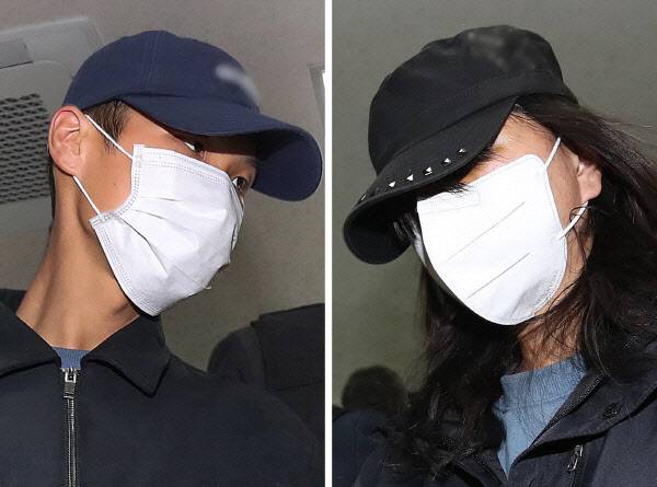 장모를 때려 숨지게 한 뒤 캐리어에 시신을 담아 유기한 혐의로 긴급체포된 20대 사위와 딸이 2일 대구 북부경찰서에서 법원 영장실질심사를 받기 위해 각각 이동하고 있다 (사진=연합뉴스)
