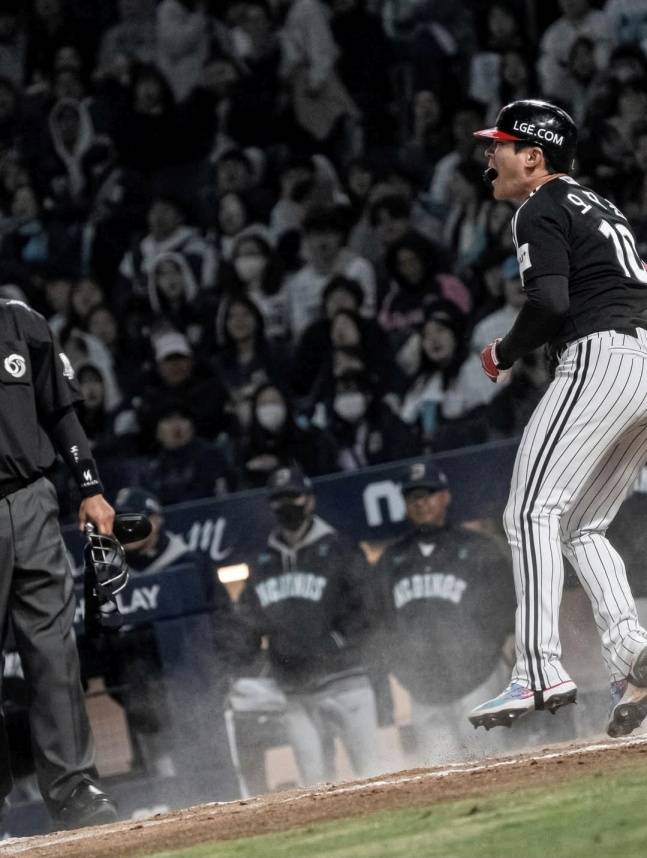 LG 오지환이 8일 창원NC파크에서 열린 2026 신한 SOL KBO리그 정규시즌 NC 다이노스와 방문경기 8회초 2사 2루에서 그라운드 홈런을 치고 포효하고 있다. /사진=LG 트윈스 제공