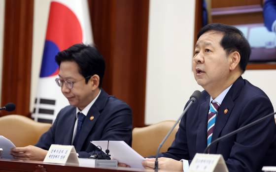 Finance Minister Koo Yun-cheol speaks during a ministerial meeting held to discuss measures to stabilize inflation at the government complex in central Seoul on April 9. [NEWS1]