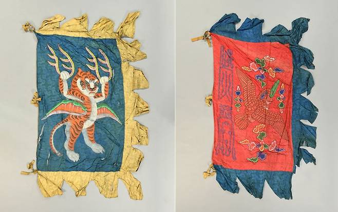 호기(왼쪽)과 주작기. 둘 다 조선시대 전문(前門) 밖에 세우던 군기다. (국가유산청 제공)