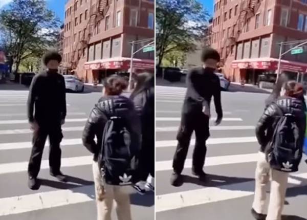 뉴욕 이스트할렘의 한 횡단보도 인근에서 10대 소년이 피해 여학생의 앞을 막아선 모습. 현지 경찰은 이 소년이 전화번호 제공을 거절한 여학생을 바닥에 내던지고 머리를 밟은 혐의로 체포됐다고 밝혔다. 사진=인스타그램 @coronavirusny 캡처