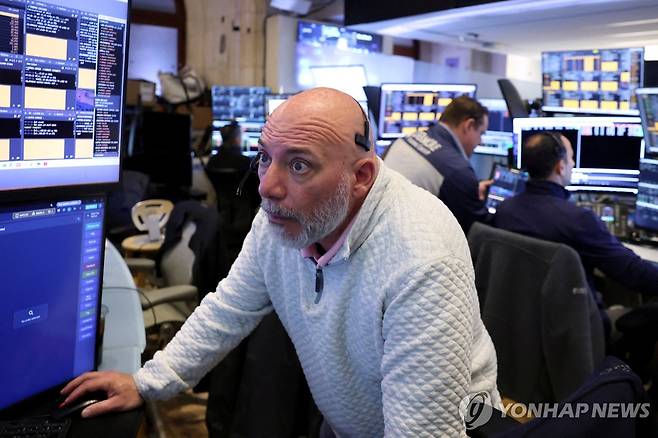 미국 뉴욕증권거래소(NYSE)의 트레이더 [로이터=연합뉴스 자료사진. 재판매 및 DB 금지]