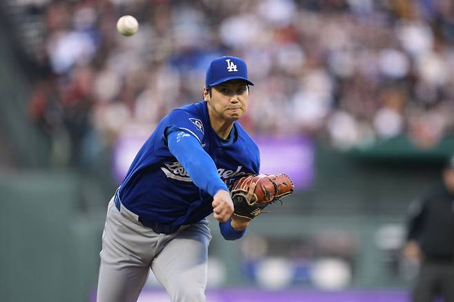 Los Angeles Dodgers pitcher Shohei Ohtani throws to a San Francisco Giants batter during the second inning of a baseball game Wednesday, April 22, 2026, in San Francisco. (AP Photo/Tony Avelar)







<저작권자(c) 연합뉴스, 무단 전재-재배포, AI 학습 및 활용 금지>