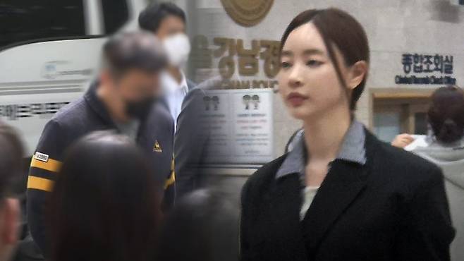 29일 경찰조사 받은 양정원 씨(우측)와 남편 이 모 씨(좌측)