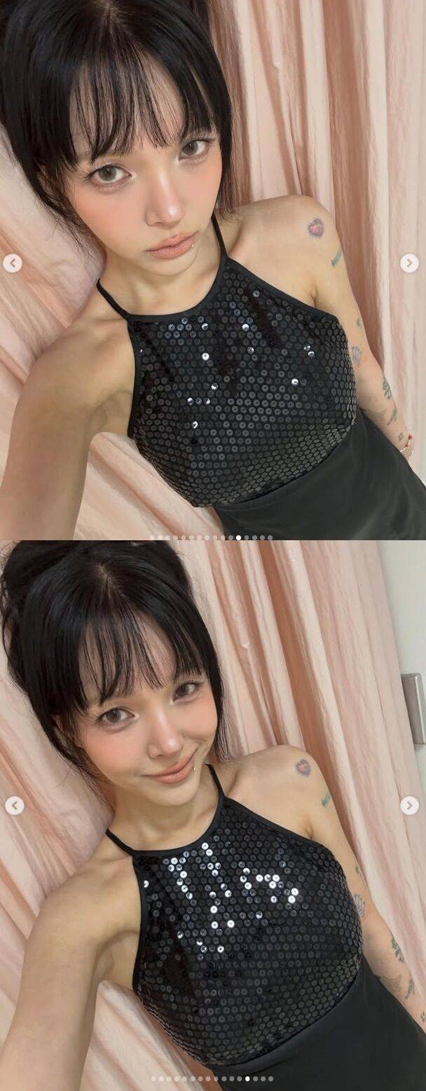 지민의 높게 묶어 올린 '업스타일' 헤어와 몽환적인 눈빛은 마치 영화 속 퇴폐미 넘치는 주인공 같은 분위기를 풍긴다./지민 소셜미디어