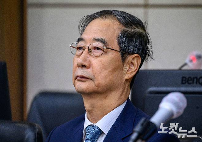 한덕수 전 국무총리가 서울 서초구 서울중앙지법에서 열린 내란 우두머리 방조 및 위증 등 혐의 재판에 피고인으로 출석하고 있다. 사진공동취재단