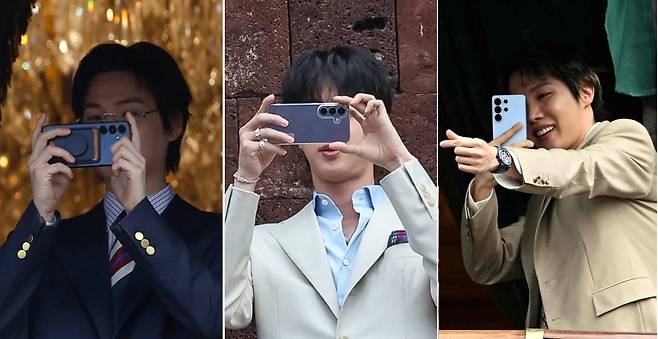 왼쪽부터 갤럭시S26 시리즈로 팬들을 찍고 있는 슈가, 진, 제이홉./AFP연합, 로이터연합뉴스