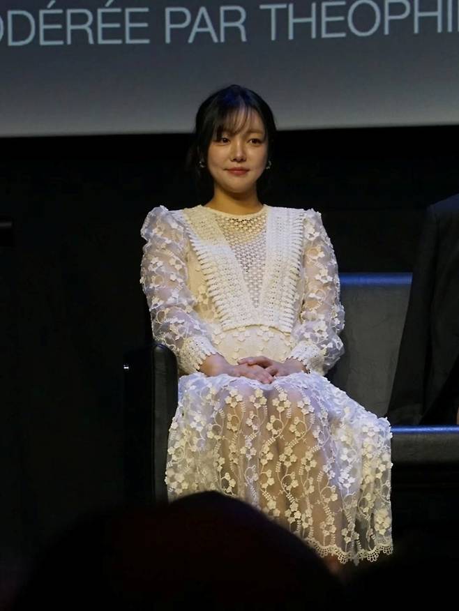 Actress Moon Ji-In shared updates on her life by releasing B-cut photos taken during her attendance at the Cannes International Series Festival in France. Through her personal channel, Moon Ji-In showcased how she perfectly pulled off a variety of styles, ranging from a black high-neck dress to a neon lime green off-shoulder dress and a white lace dress.In particular, a photo taken against a beach backdrop drew attention as she cradled her belly with her hands, clearly revealing her rhine. Moon Ji-In also displayed her cheerful charm by leaving witty replies to compliments from acquaintances.The film *Genfluencer*, starring Moon Ji-In, was invited to the Rendezvous section of the non-competition category at the 9th Cannes International Series Festival. Meanwhile, Moon Ji-In married comedian Kim Ki-ri in May 2024 and is expecting a son this coming August.