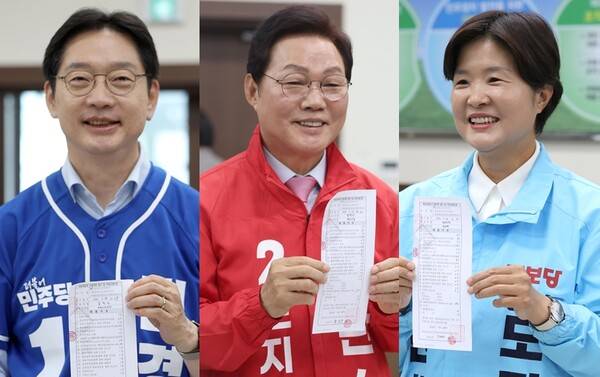 &nbsp;민주당 김경수 후보와 국민의힘 박완수 후보, 진보당의 전희영 후보가 지난 14일 후보 등록을 한 뒤 포즈를 취하고 있다. 2026.5.14 연합뉴스
