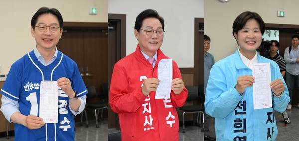 (왼쪽부터)김경수(더불어민주당)·박완수(국민의힘)·전희영(진보당) 경남도지사 후보가 14일 경상남도선거관리위원회에서 후보자 등록을 하고 있다. /김구연 기자