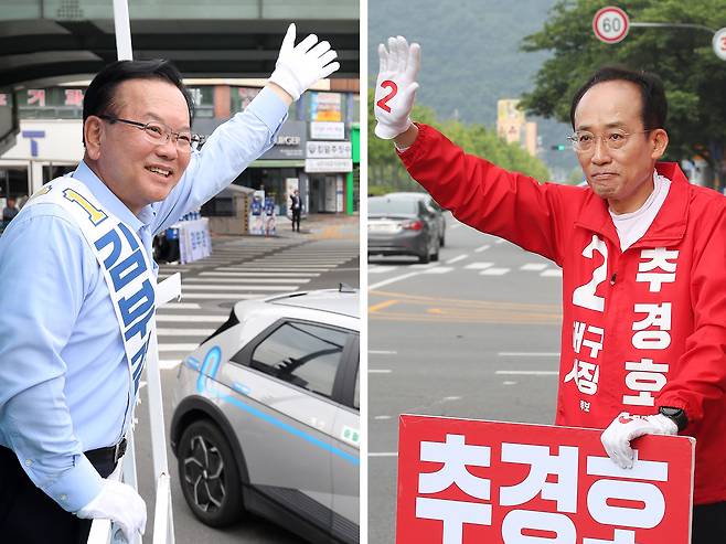김부겸 더불어민주당 대구시장 후보(왼쪽)가 26일 오전 대구 달서구 상인네거리에서 출근길 시민들을 향해 인사하고 있다. 추경호 국민의힘 대구시장 후보는 같은 날 오전 수성구 두산오거리에서 출근길 시민들을 향해 인사를 하고 있다. /뉴스1
