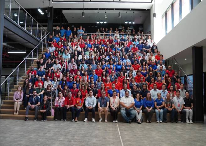 Tegra employees gather at the company's Honduras headquarters on May 26 for a two-year anniversary celebration of Sae-A Trading's acquisition of Tegra. [TEGRA]