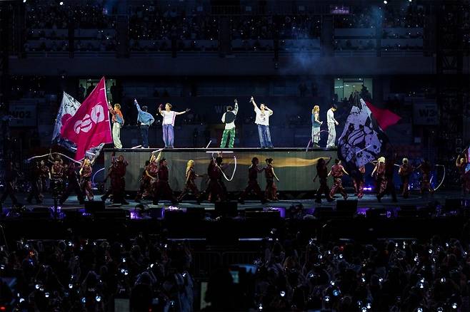 To celebrate the 13th anniversary of the group BTSs debut with *Bon Voyage*, the group held the BTS World Tour Arirang in Busan at the Busan Asiad Main Stadium from the 12th to the 13th. The concert held added significance as it took place in Busan, the hometown of the members, and a total of 110,000 spectators attended over the two days to celebrate the 13th birthday of *BTS Bon Voyage* together.