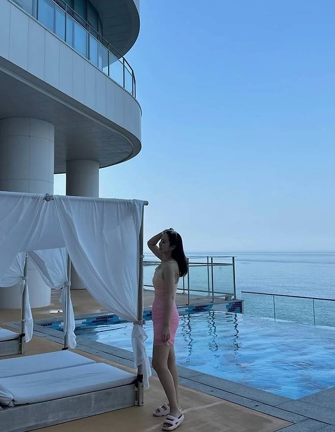 Broadcaster Park Ji-yoon shared a cheerful glimpse into her daily life by revealing her recent visit to a swimming pool with her son through her social media. Park Ji-yoon candidly shared an anecdote about how her son teased her by mentioning her accessory breasts while she was taking photos at the pool.