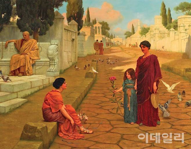 존 윌리엄 고드워드의 ‘폼페이 성문 밖에서’(1905). 화산재 아래 묻힌 고대 도시 폼페이를 상상을 넘어선 역사적 고증을 기반으로 복원했다. 주로 화실에서 여성 인물에 집중했던 다른 그림들과 달리 풍경과 인물, 서사를 완벽한 밀도로 결합한 야외 군상화다. 이탈리아를 처음 찾았을 때 받은 감동을 그대로 쏟아부으면서 결국 사라질 도시라는 비극적 결말을 희석했다. 캔버스에 유채, 71×91.5㎝. 개인소장.