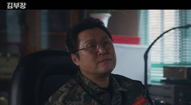 In the SBS drama *Director Kim*, tension mounted as Director Kim reunited with Han-su and Jin-cheol. Meanwhile, Kang Chan vowed revenge and attempted a secret deal with a North Korean official to eliminate Director Kim.