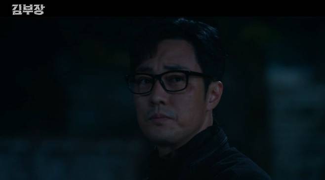 In the SBS drama *Director Kim*, tension mounted as Director Kim reunited with Han-su and Jin-cheol. Meanwhile, Kang Chan vowed revenge and attempted a secret deal with a North Korean official to eliminate Director Kim.