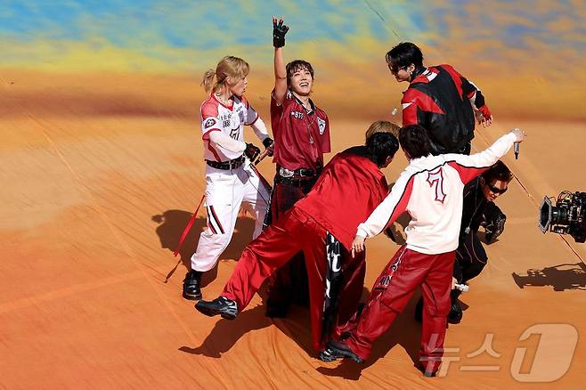 The group BTS appeared at the 2026 FIFA World Cup Final Halftime Show, receiving enthusiastic cheers from audiences around the world. Member Suga left a deep impression by taking the stage wearing an outfit adorned with a Red Devils patch.BTS Bon Voyage graced the stage as a co-headliner alongside Madonna, Shakira, and Justin Bieber at the final held at MetLife Stadium in New Jersey, USA. They heightened the atmosphere by passionately singing their hit song Dynamite, and the entire group, starting with member Jungkook, delivered a high-quality performance.This halftime show was a first in World Cup history, designed to unite the world by combining sports and music. It garnered attention as it was curated by Chris Martin of Coldplay, and BTS Bon Voyage had a meaningful time conveying a message of hope and harmony through music.The members concluded the performance in a peaceful atmosphere, performing the finale together with a childrens choir. Jungkook continued his special connection with the World Cup by taking the stage for the final match, following the opening ceremony of the 2022 Qatar World Cup.