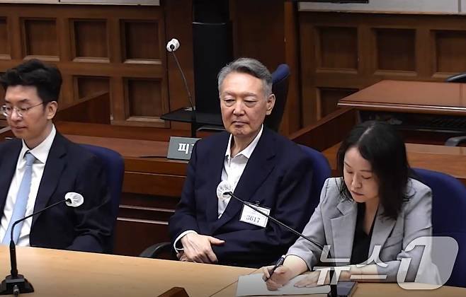 27일 서울 서초구 서울중앙지방법원에서 윤석열 전 대통령의 공직선거법 위반 혐의 1심 선고가 진행되고 있다. 이날 법원은 윤석열에게 징역 1년 6개월에 집행유예 3년을 선고했다. (서울중앙지방법원 제공. 재판매 및 DB금지) 2026.7.27 ⓒ 뉴스1