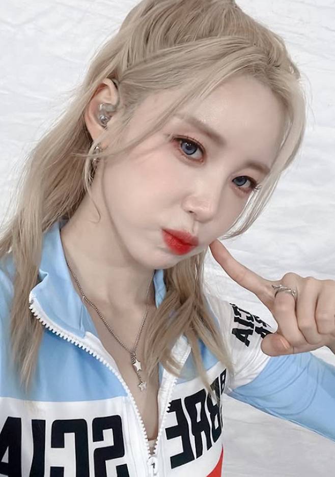 Jeon Hyo-sung, a member of the group Secret, showcased her ever-fresh charm by sharing behind-the-scenes photos from her stage performance on her social media. In the photos taken after her performance at the Andong Super Festa, Jeon Hyo-sung flaunted a radiant summer look and visuals that rival those of active idols.In the released photos, Jeon Hyo-sung showcased a refreshing look by pairing a white top with a blue jacket, perfectly pulling off her bleached blonde hair and colored contact lenses. Her youthful appearance, which makes it hard to believe she is 36, drew an enthusiastic response from fans.Meanwhile, Jeon Hyo-sung made a comeback with Secret—her first in 12 years—alongside Jung Ha-na and Ye-bin on the 18th, releasing the special mini-album Secret Flavor and continuing her promotional activities.