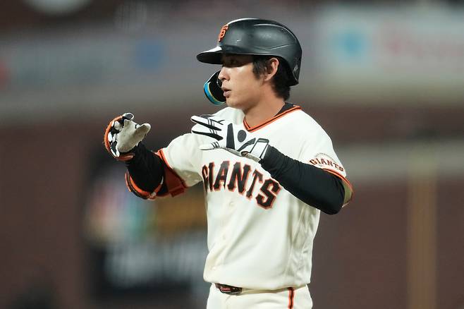 San Francisco Giants' Jung Hoo Lee gestures after hitting an RBI single during the seventh inning of the second baseball game of a doubleheader against the Arizona Diamondbacks, Saturday, Aug. 29, 2026, in San Francisco. (AP Photo/Jeff Chiu)        <저작권자(c) 연합뉴스, 무단 전재-재배포, AI 학습 및 활용 금지>
