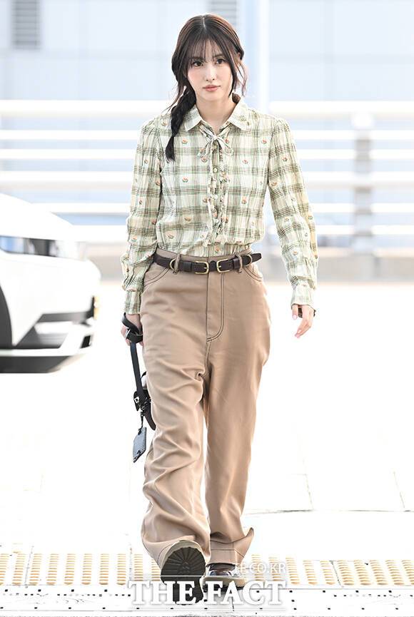 Momo of the group TWICE is departing from Incheon International Airport in Jung-gu, Incheon, on the morning of the 21st to attend the Onitsuka Tiger fashion show.Photo & Video Planning Department