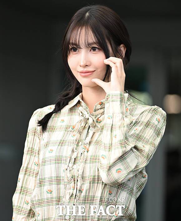 Momo of the group TWICE is departing from Incheon International Airport in Jung-gu, Incheon, on the morning of the 21st to attend the Onitsuka Tiger fashion show.Photo & Video Planning Department