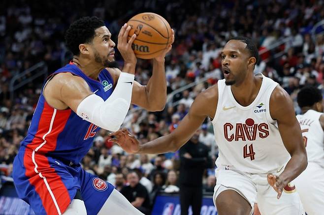 Cavaliers Pistons BasketballDetroit Pistons forward Tobias Harris, left, looks for a shot against Cleveland Cavaliers center Evan Mobley (4) during the first half of Game 7 in a second-round NBA basketball playoffs series, Sunday, May 17, 2026, in Detroit. (AP Photo/Duane Burleson)