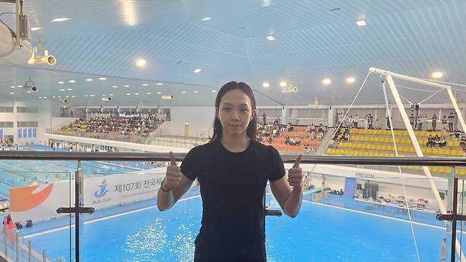 수영 김서영이 21일 제주시 제주종합경기장 수영장에서 열린 제107회 전국체육대회 여자 일반부 접영 100ｍ 결승에서 대회 신기록을 작성하며 우승을 차지했다. 사진 | 올댓스포츠