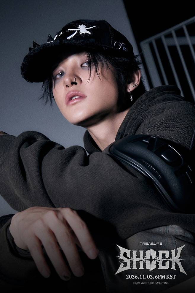 YG Entertainment, the groups agency, posted TREASURE - [SHOCK] VISUAL PHOTO on its official social media channels on the 27th.The members bold style transformations stand out in the released photos. Choi Hyun-suk showed off unrivaled hip-hop swag by mixing and matching a bold buzz cut with unique sunglasses and sporty gloves. Jihoon gazes at the camera with deep eyes and heavy smoky makeup, while Yoshi also catches the eye with his black hair and silver highlights.The audio spoiler, partially unveiled via social media on the 26th, also garnered attention. The lyrics SHOCK SHOCK, which stick in your head intensely, create a perfect harmony with heavy bass and sharp synth sounds, raising expectations.TREASUREs new digital single, SHOCK, will be fully unveiled on November 2 at 6 PM.