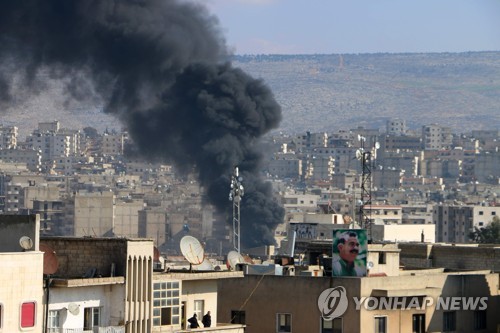 시리아 쿠르드 도시 아프린에서 솟는 연기 [AFP=연합뉴스]