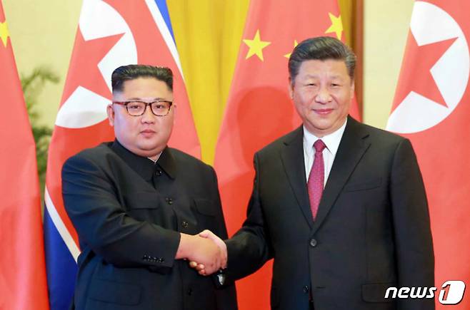 북한 노동신문이 김정은 국무위원장의 세 번째 방중 소식을 20일 보도했다. (노동신문) 2018.6.20/뉴스1 © News1 임세영 기자