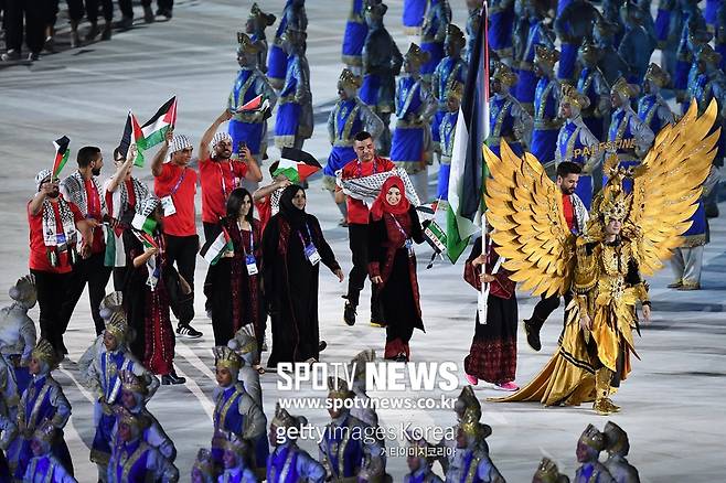 ▲ 2018년 자카르타-팔렘방 아시안게임 개막식에 참가한 팔레스타인 선수단이 입장하고 있다.