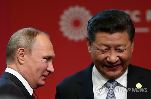 시진핑 중국 국가주석(오른쪽)과 블라디미르 푸틴 러시아 대통령[EPA=연합뉴스 자료사진]
