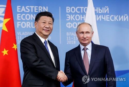 블라디미르 푸틴 러시아 대통령(오른쪽)과 시진핑 중국 국가주석 [로이터=연합뉴스]