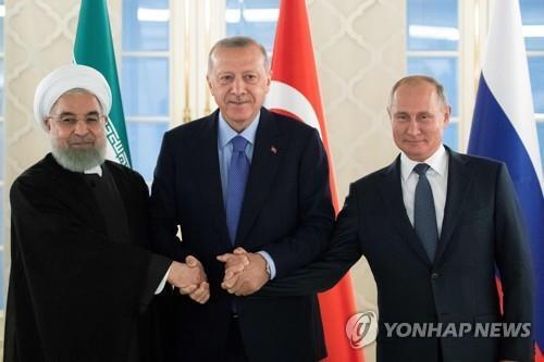 터키 수도 앙카라에서 만난 이란(좌)·터키·러시아(우) 대통령   [AFP=연합뉴스]