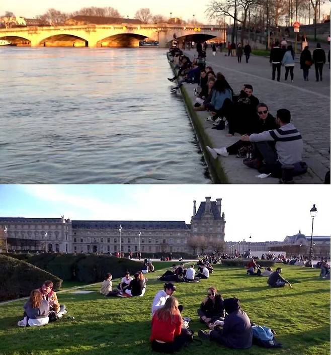 지난 일요일(15일) 파리 센느강과 루브르 박물관 앞 잔디밭에서 파리 시민들이 햇살을 즐기고 있다/사진제공=로이터 Reuters