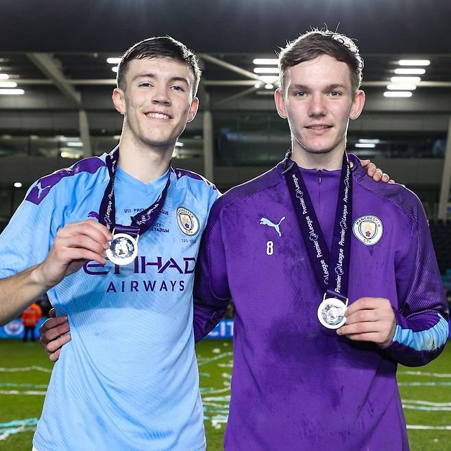 ▲ 찰리 맥닐(왼쪽) ⓒ '스포츠 일러스트레이티드' 웹사이트 갈무리