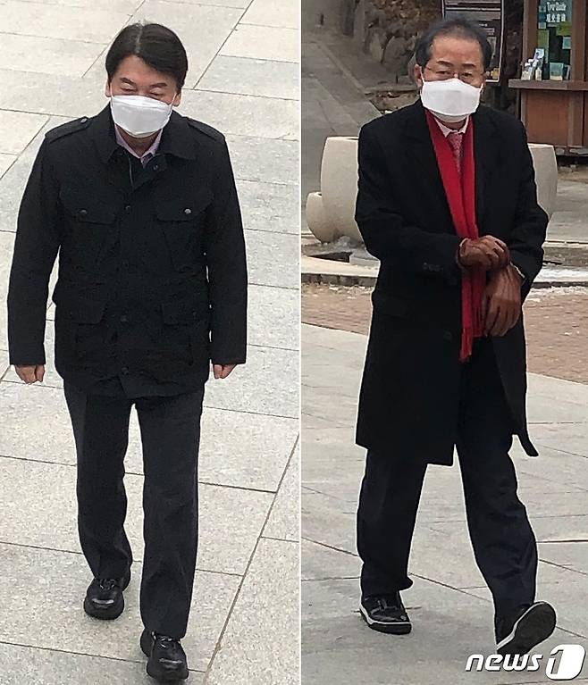 안철수 국민의당 대표(왼쪽)와 홍준표 무소속 의원이 11일 오후 각각 신년인사를 위해 대구 동구 팔공산 동화사를 방문해 경내를 걷고 있다. 2021.1.11/뉴스1 © News1 남승렬 기자